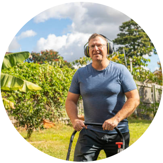 Man Mowing The Lawn — Brisbane, QLD — Black & White Home Services Man Mowing The Lawn — Brisbane, QLD — Black & White Home Services