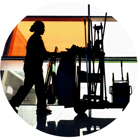 Janitor Pushing Cleaning Cart — Brisbane, QLD — Black & White Home Services