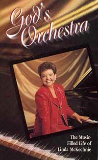 A woman is sitting at a piano on the cover of a book titled god 's orchestra.