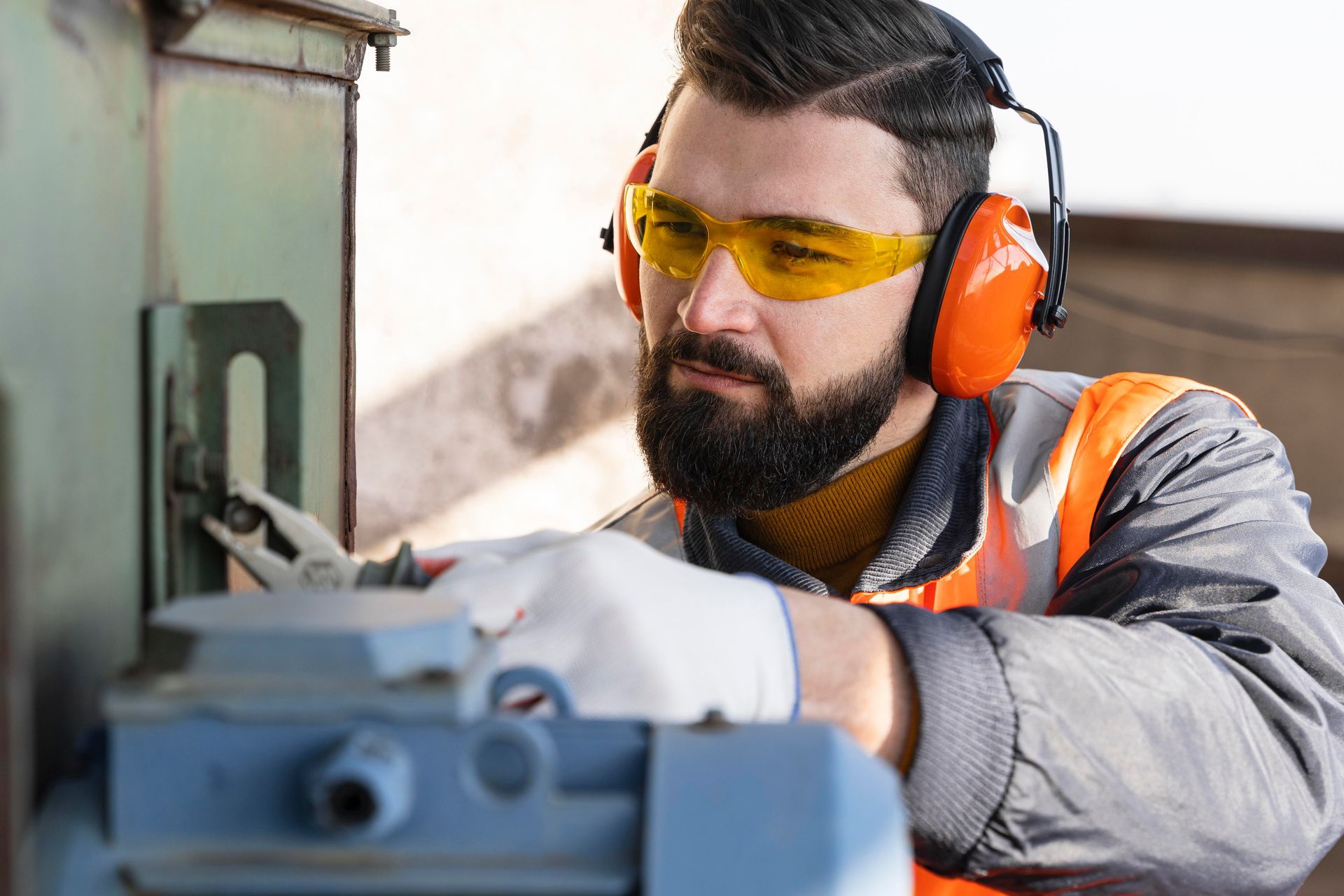 Man wearing hearing protection while working