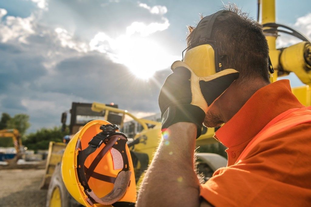 Employee removing their hearing protection
