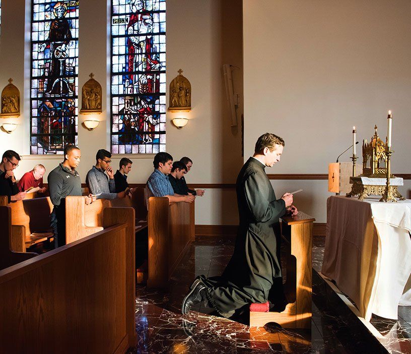 Knights Kneeling Behind Priest at Altar