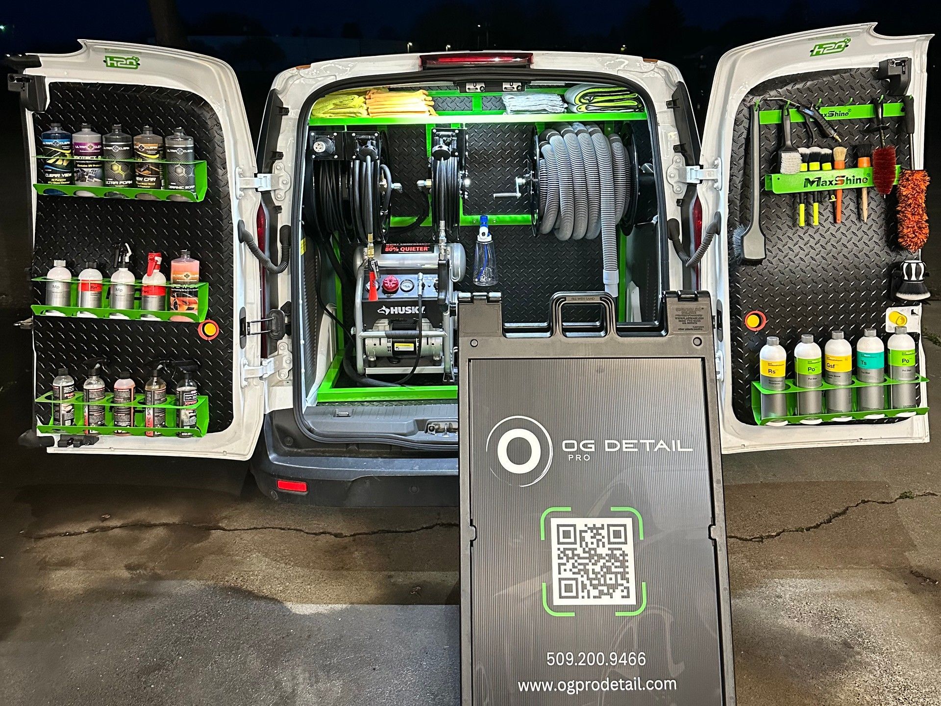OG Pro Detail mobile detailing unit with its doors open, showing its own water, power, hoses and professional products
