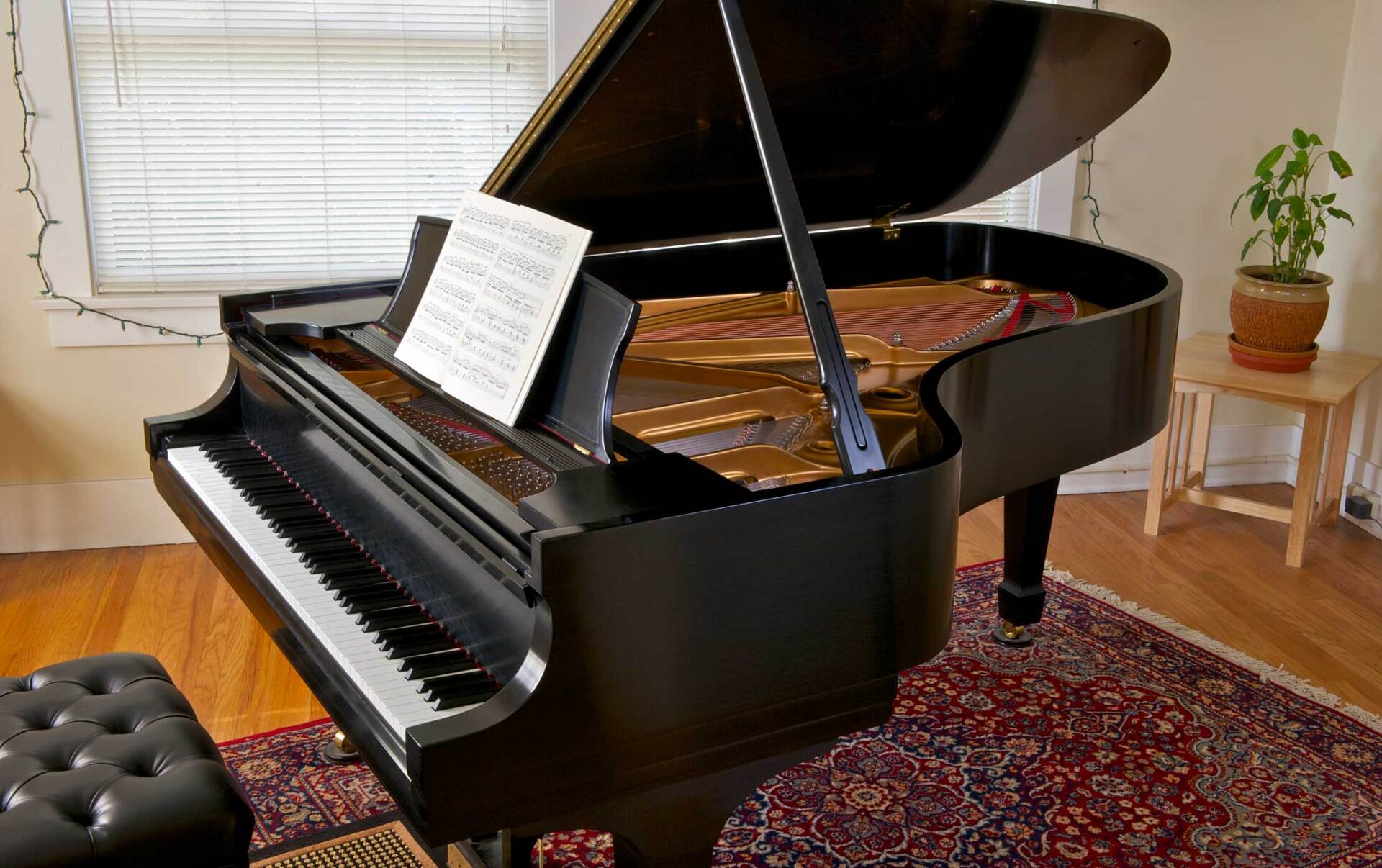 Grand Piano with Open Lid and a Piano Score — Baltimore, MD — Johnson's Piano Moving