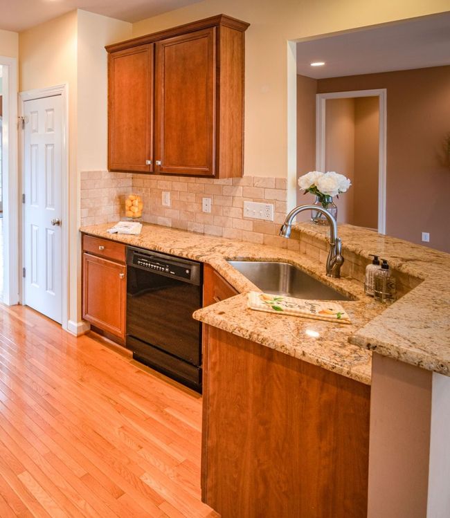 Recently completed plumbing installation with updated kitchen sink fixtures
