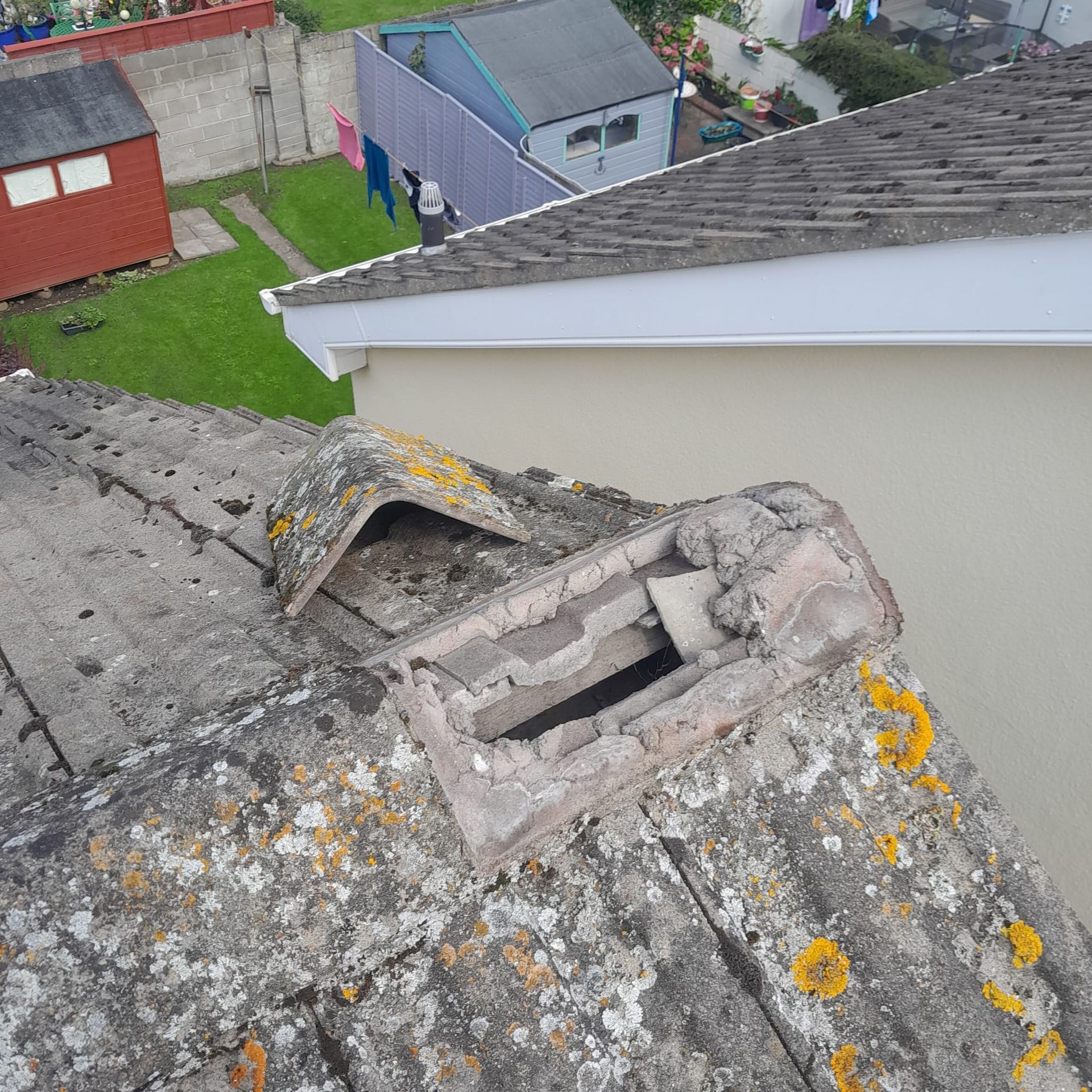 An aerial view of a roof with a hole in it