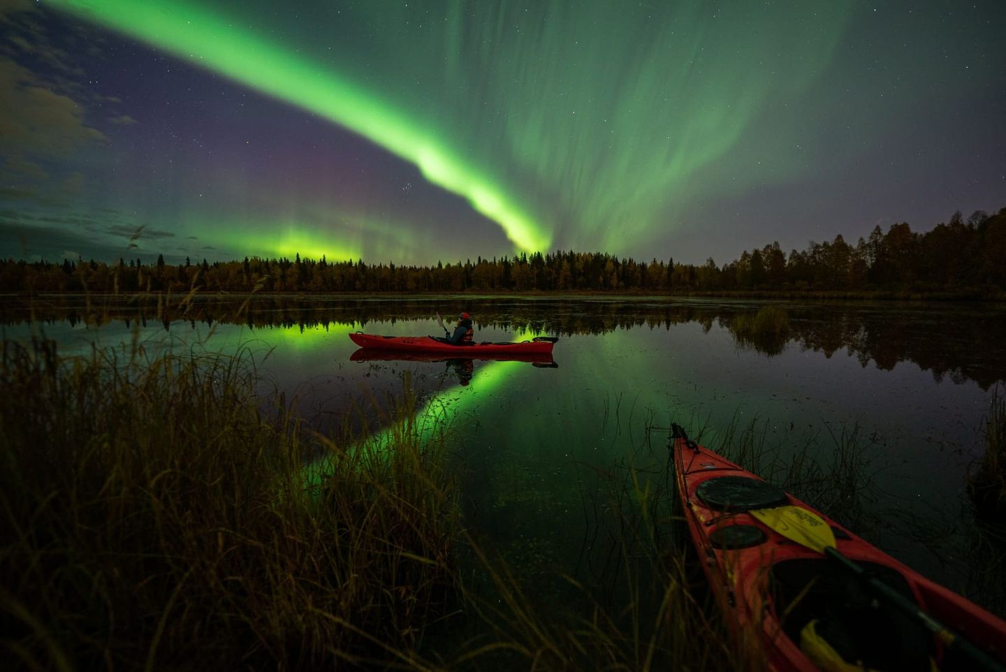 Aurora reflection while kayaking