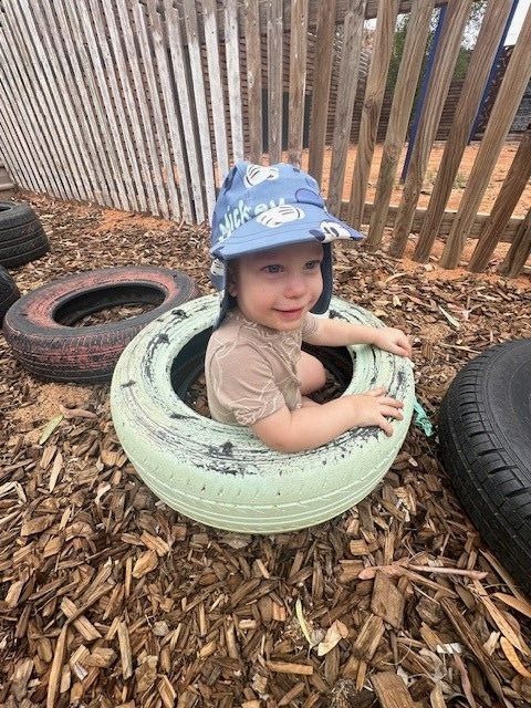 Boy On A Swing — Gap Community Early Learning Centre In The Gap, NT
