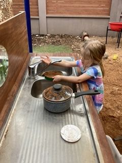 A Child Playing In the Garden— Gap Community Early Learning Centre In The Gap, NT