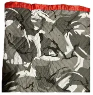 Gray and white camouflage fabric with red trim.