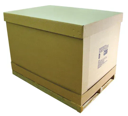 Large cardboard box on a pallet, possibly for shipping or storage.