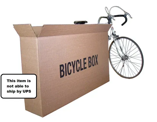 Bicycle box next to a bicycle with a note that the item can't be shipped by UPS.