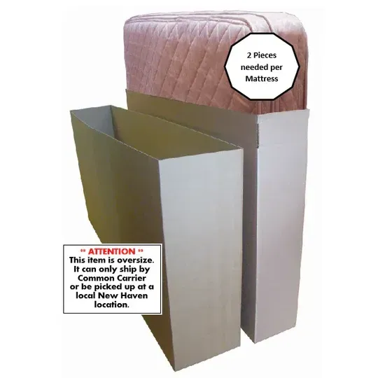 Two cardboard mattress protectors with a pink upholstered object, labeled