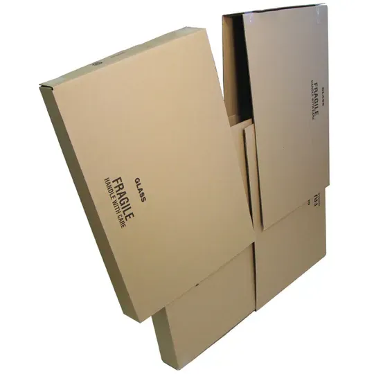 Cardboard boxes, partially assembled, stacked. Brown, with 