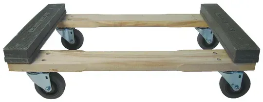 Wooden furniture dolly with four swivel wheels.