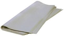 Stack of off-white paper, folded in half, lying on a surface.