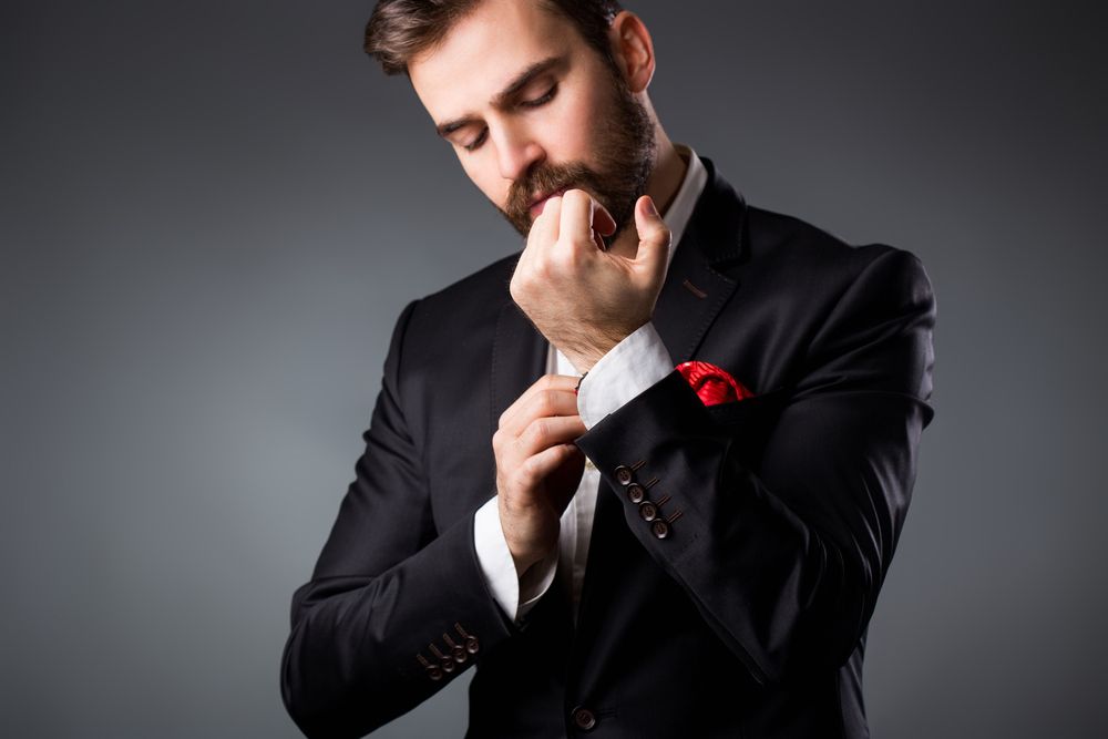 Elegant Young Man Getting Ready — New Park Suit Hire & Menswear in Hermit Park, QLD