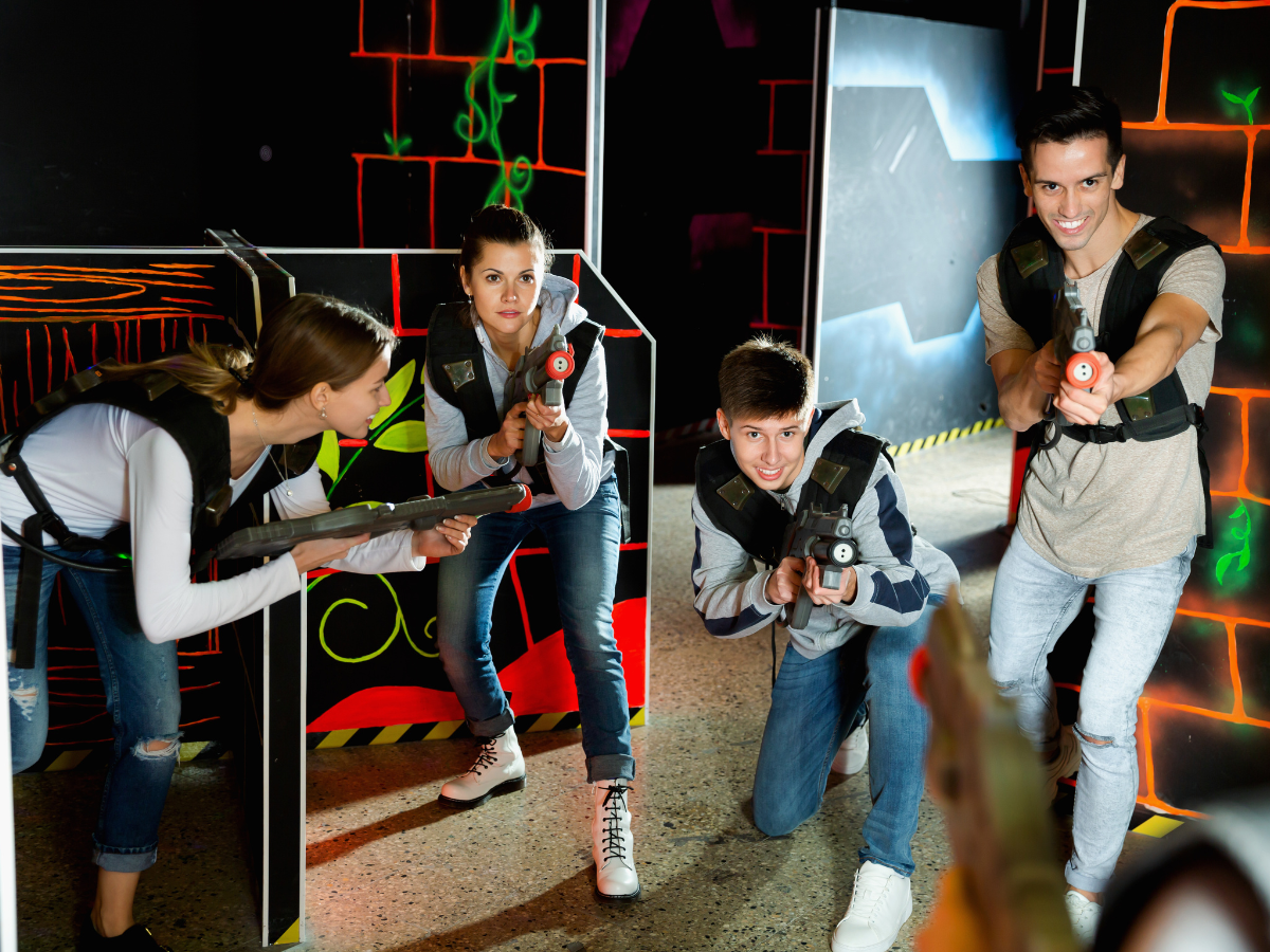 A group of people are playing laser tag.