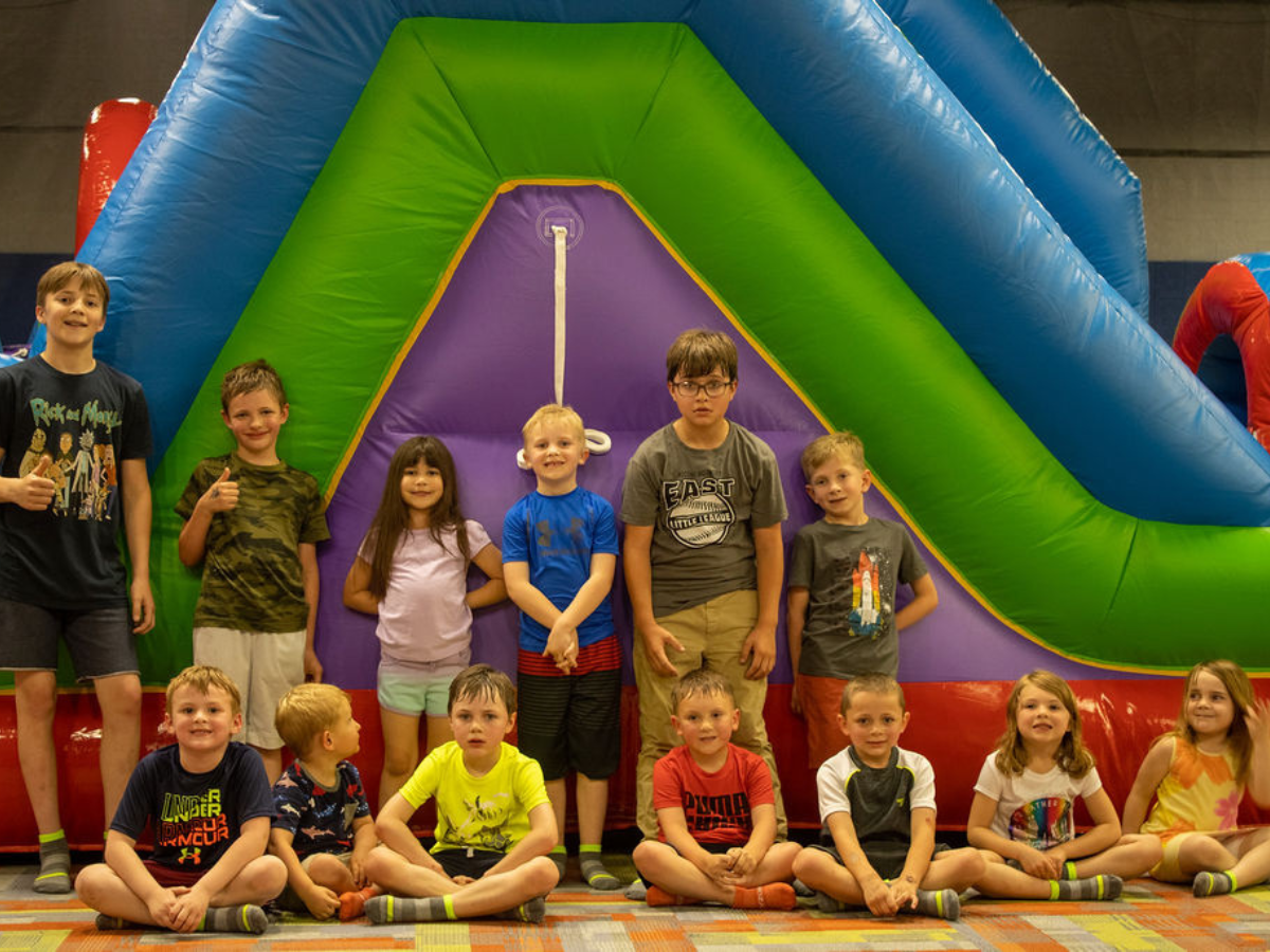 A group of friends are playing a game of laser tag