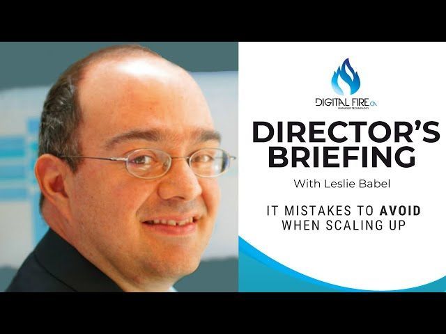Leslie Babel of Digital Fire is smiling in front of a sign that says director's briefing