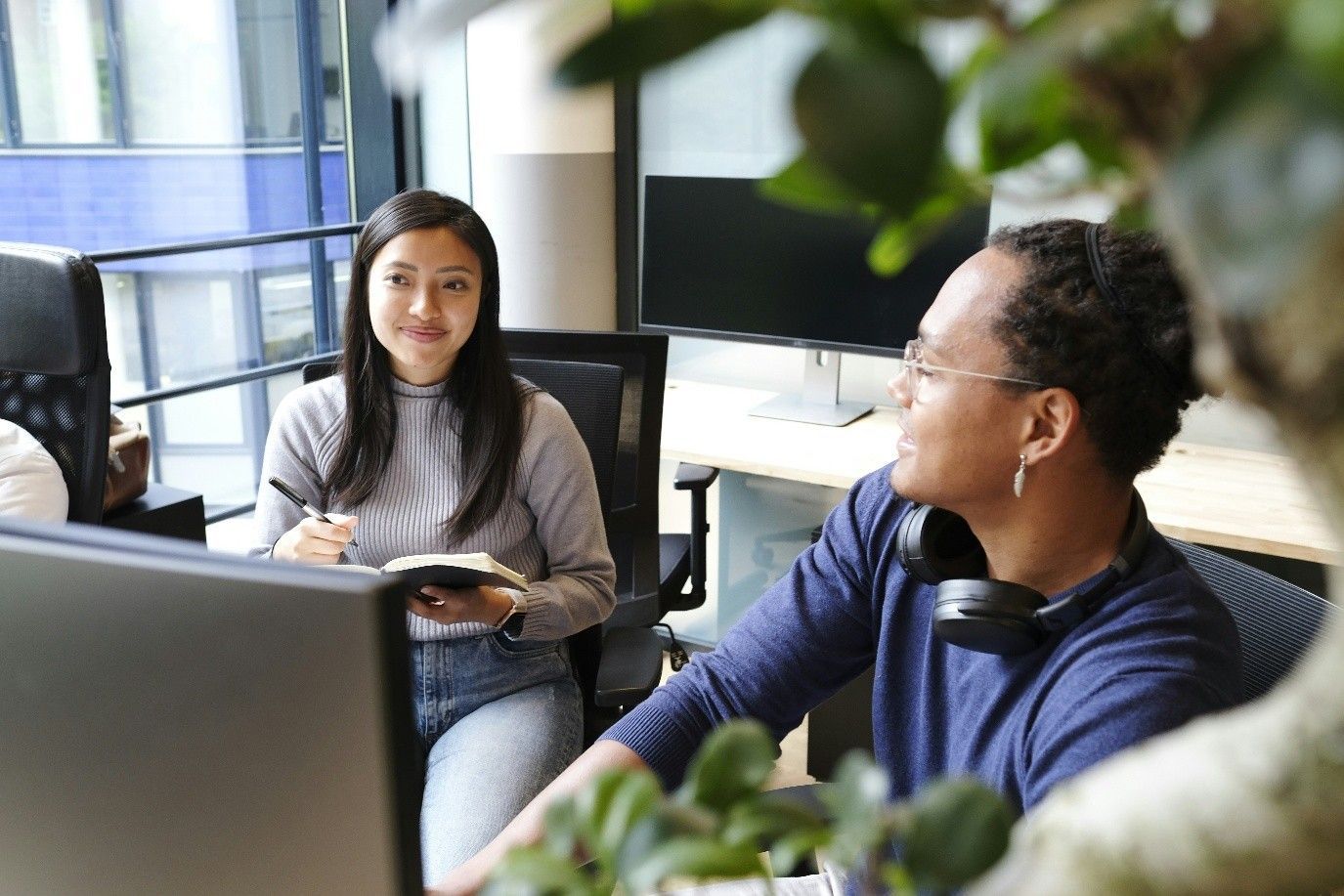 Woman and man in a meeting in the office