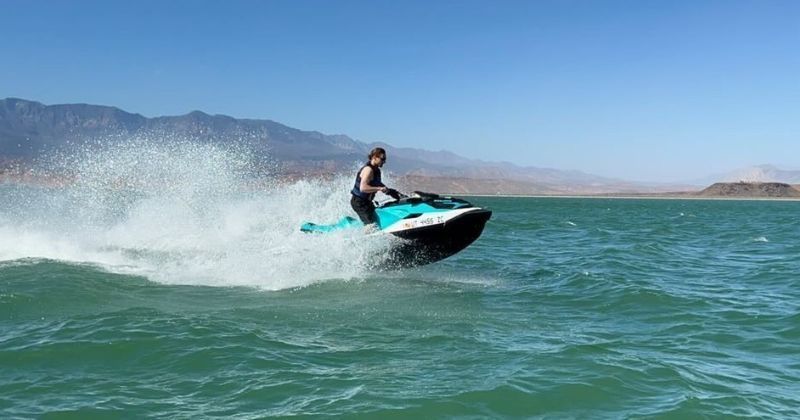 Teal and white Sea Doo Jet Ski