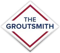 Logo for The Groutsmith: white diamond with blue text inside a red diamond.