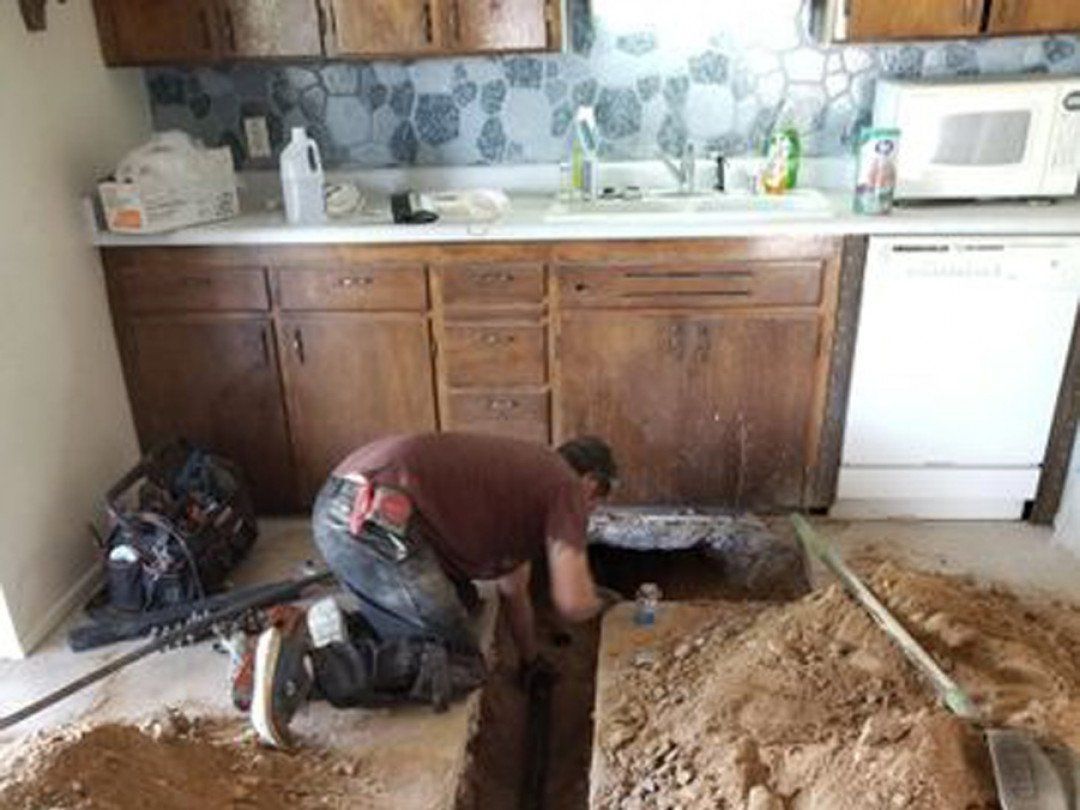 Man locating the problem of the pipeline
