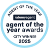 Gold “agent of the year awards” badge with “agency agent of the year awards city winner 2025” text.