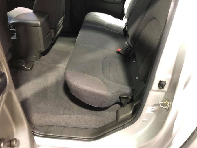 The Back Seat Of A Car With A Seat Belt On It — Townsville Car Care Centre In Aitkenvale, QLD