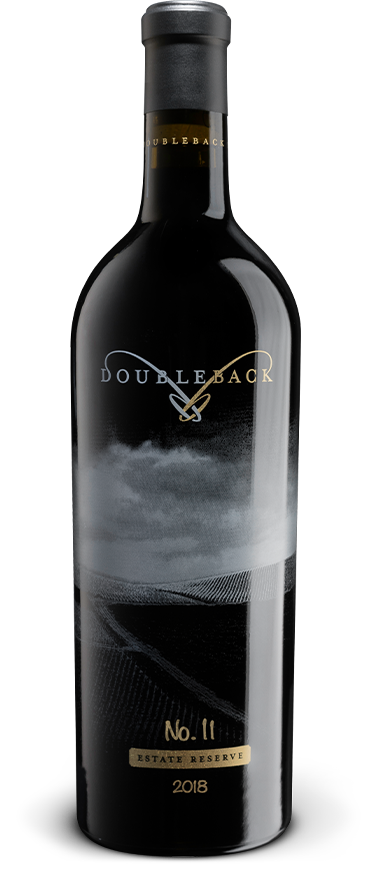 Black wine bottle with gold label and neck foil, labeled “No. 11” on a white background