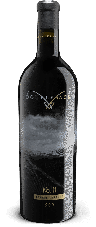 Black wine bottle with gold label on a white background