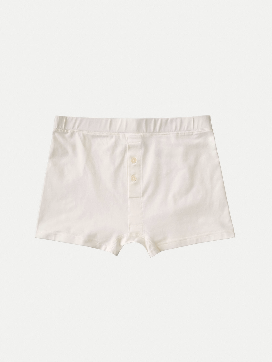A pair of white boxer shorts on a white background.