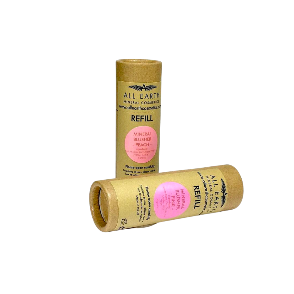 Two tubes of all earth lip balm on a white background