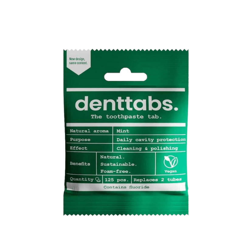 A green bag of denttabs toothpaste tablets
