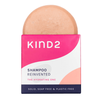 a pink and white box of kind2 shampoo