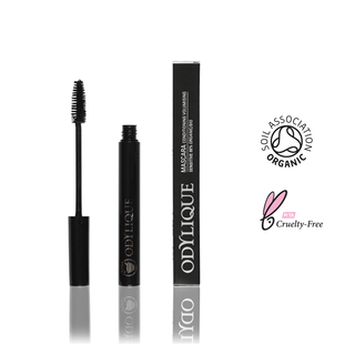 A tube of mascara is sitting next to a tube of mascara.