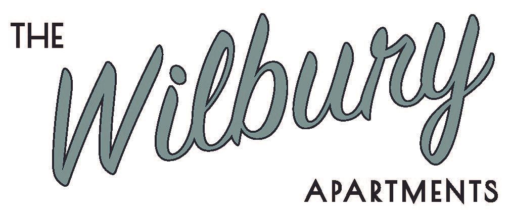 The Wilbury Apartments logo in gray script on a white background