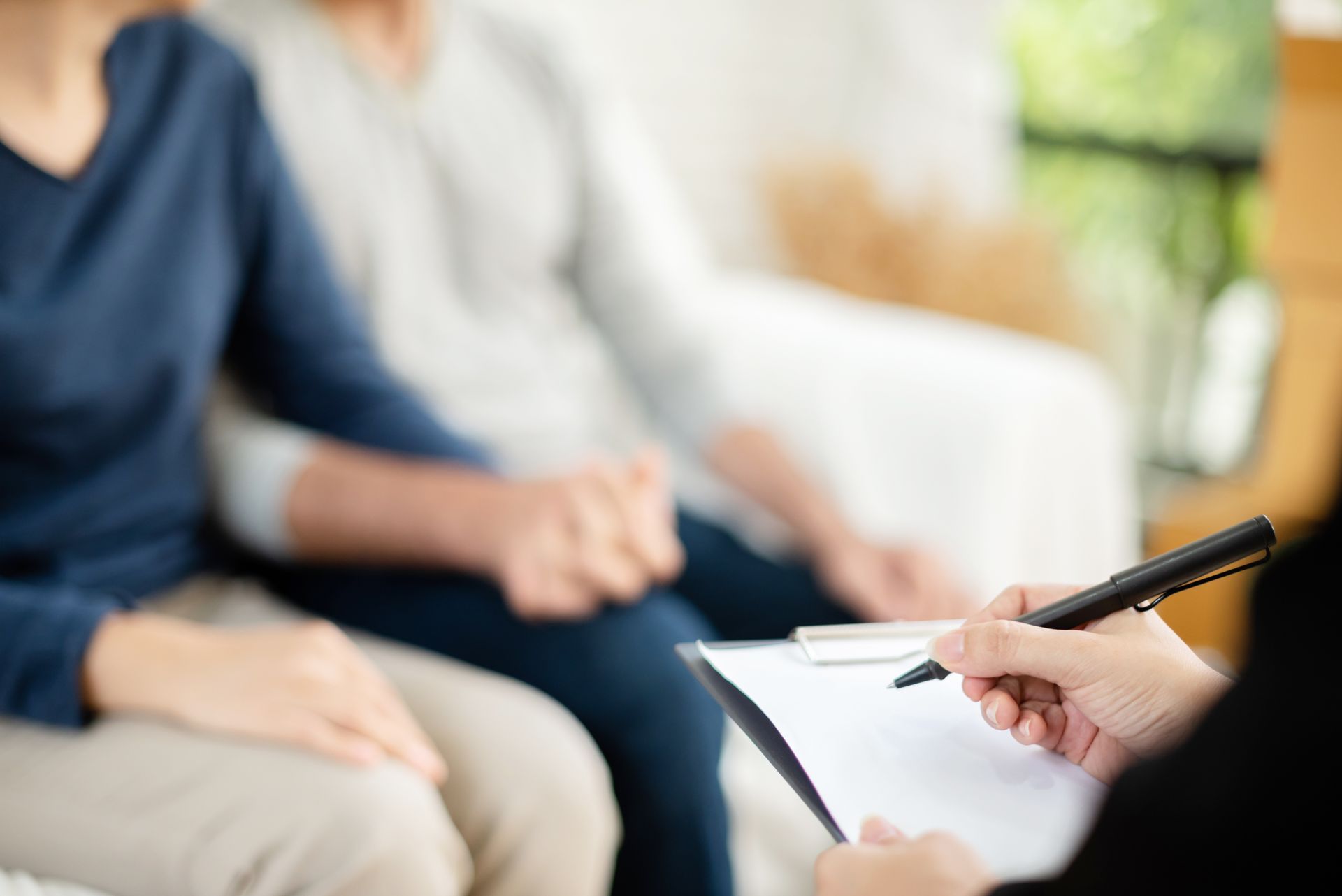 A couple consults with a retirement planning advisor. A couple consults with a retirement planning advisor.