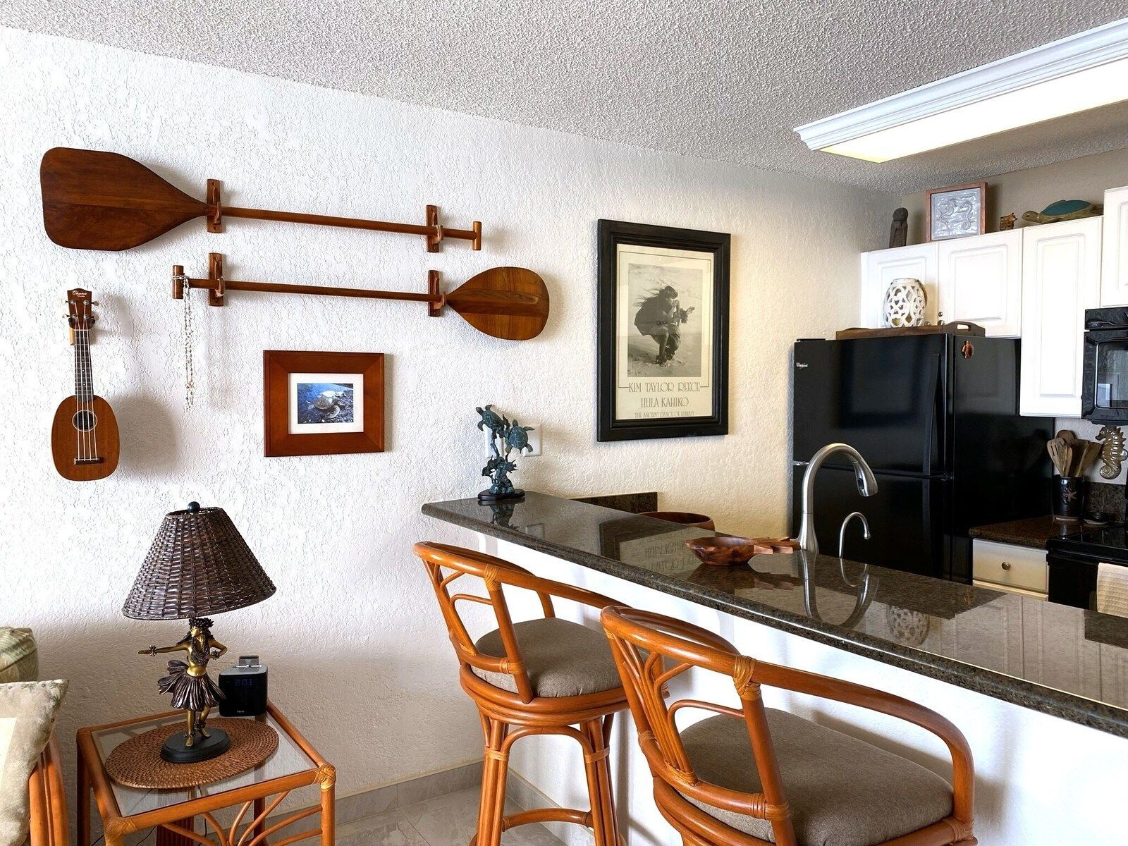 A22 kitchen with granite bar and two stools