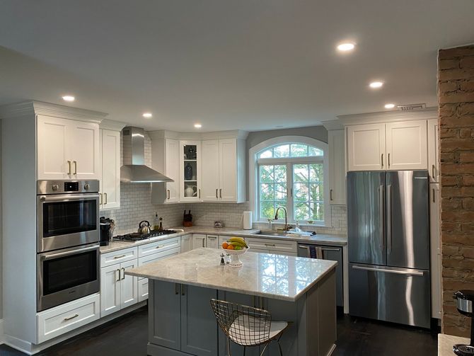 Kitchen interior with built in white cabinets