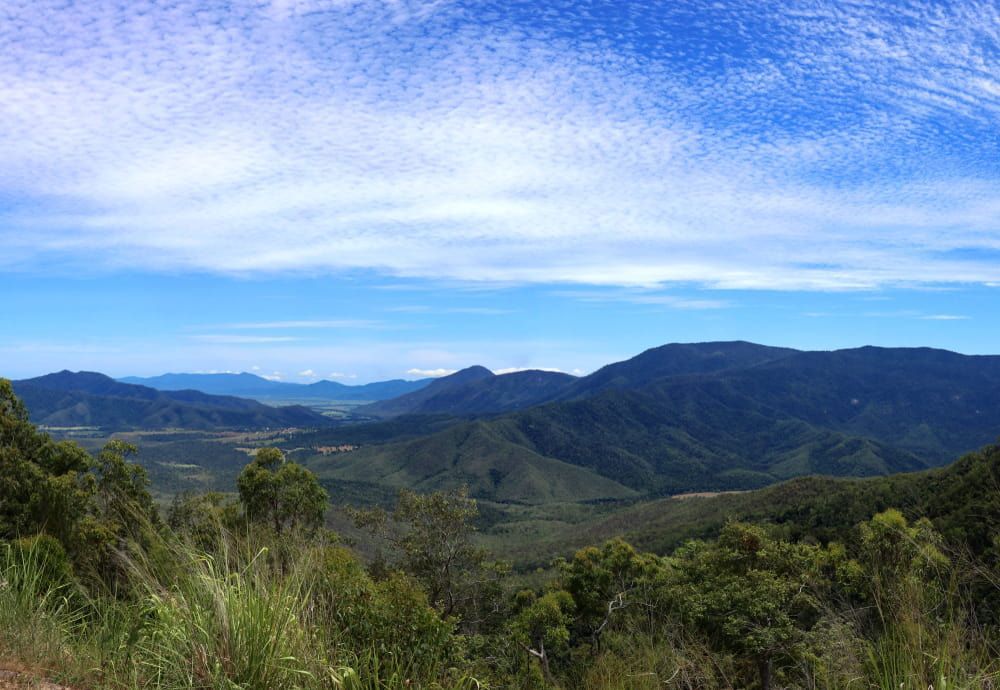 A View Of A Valley Surrounded By Mountains — Doug Simpson Piano Tuning In Gordonvale, QLD