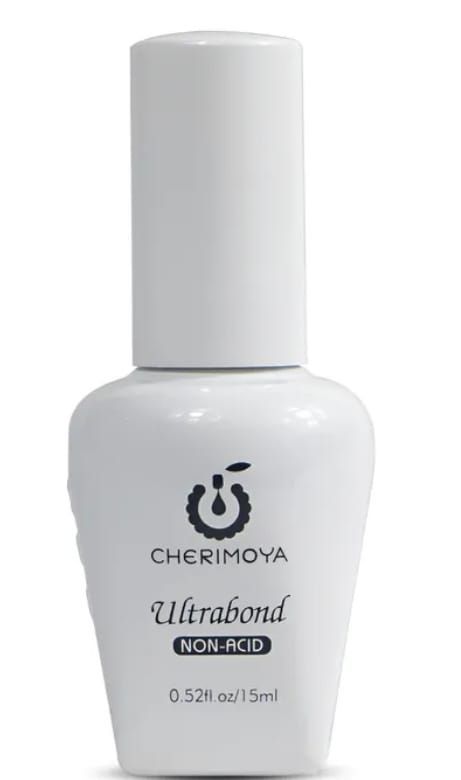 Frasco blanco de producto para uñas sin ácido CHERIMOYA Ultrabond con tapa alta sobre fondo liso.