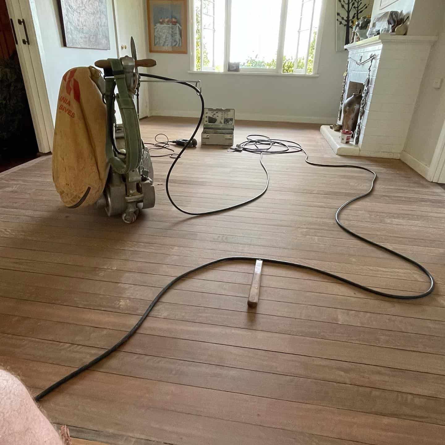 Timber Floor Sanding in Process with  Lot of Equipments — Floor Sanding in Kearneys Spring, QLD