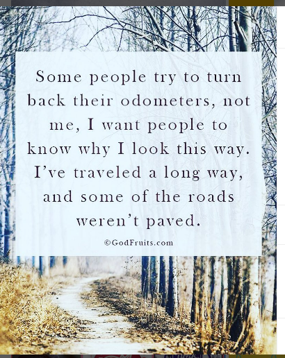 Text quote over a blurred path: