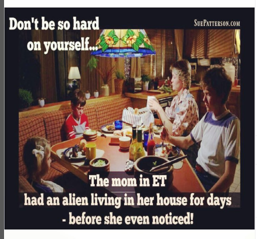 A humorous meme showing a scene from E.T. with text saying