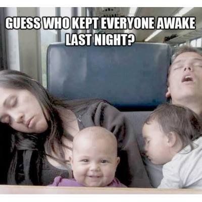 Sleeping family on a bus with a smiling baby in front, text: