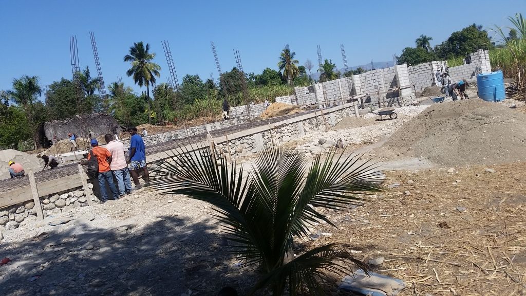 Noyau school foundation and beginning of building.