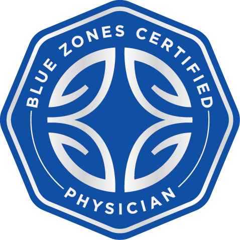 Blue Zones Certified Physician logo, blue octagon with white text and emblem.