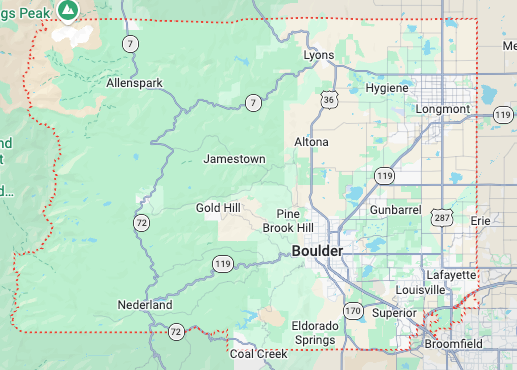 Map of Boulder, Colorado and nearby towns with roads, green terrain, and a blue lake.
